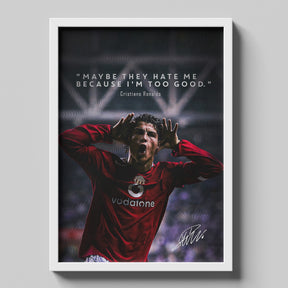 Framed poster of a soccer player in a red jersey with a quote by Cristiano Ronaldo on a gray background.